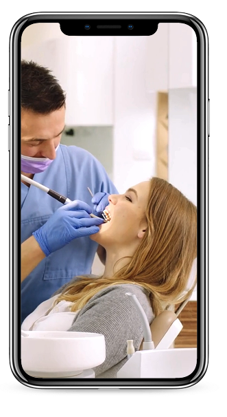 Mobile phone displaying dental procedure 1